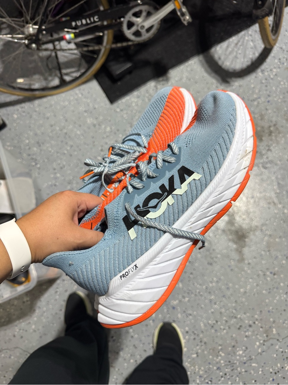 Hoka men’s Light Blue & Orange PROFLY Running Shoes